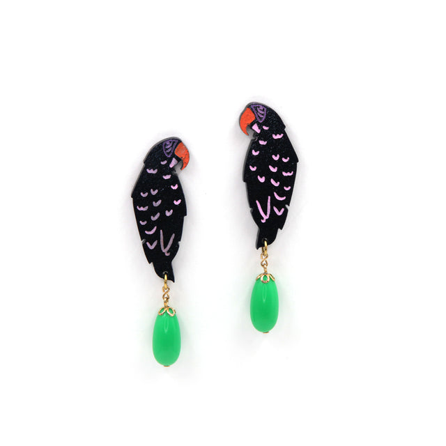 laser cut parrot statement earrings, hand painted with green vintage beads on a white background
