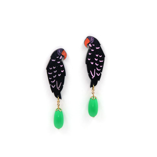 laser cut parrot statement earrings, hand painted with  green vintage beads on a white background