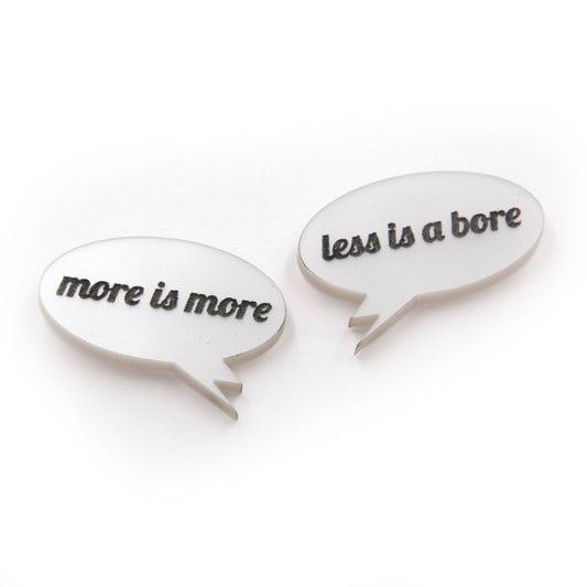 side view of More is more & less is a bore - Laser cut acrylic speech bubble pin brooches on a white background