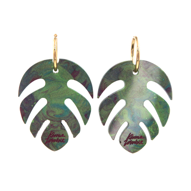 green and pink marbled resin monstera leaves statement gold plated hoop earrings on a white background