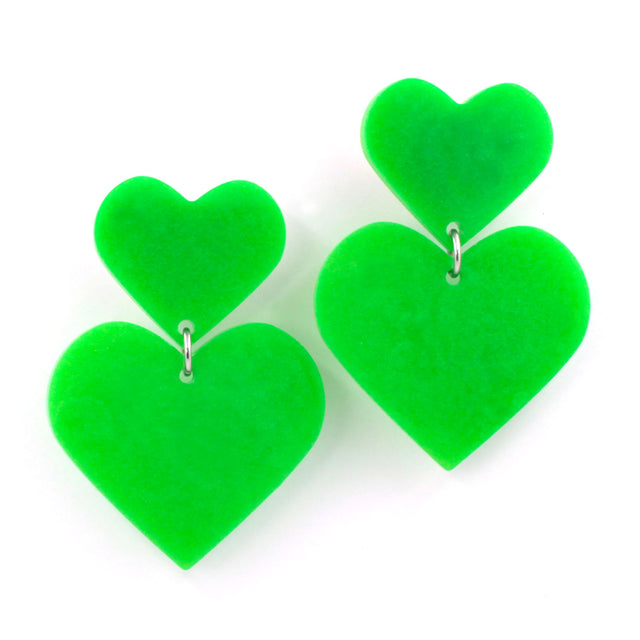 lime green double hearts earrings hanging from a white background.