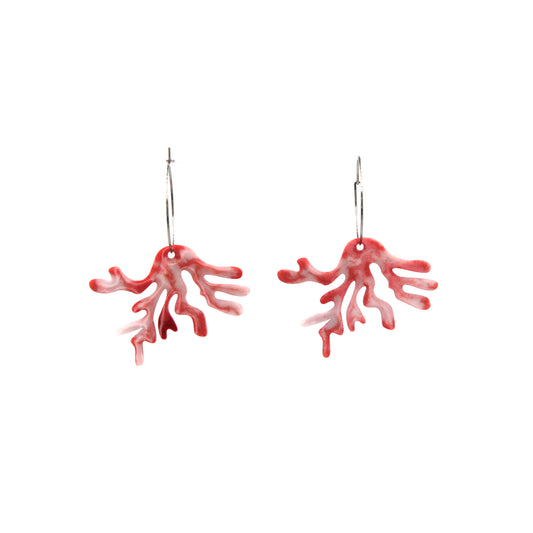 white and light red resin coral hoops earrings on a white background