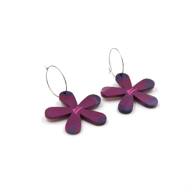 back of the earrings berry pink, purple and white marbled resin statement flower hoop earrings on a white background