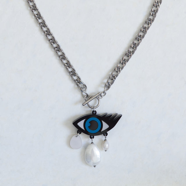 Collier statement mauvais œil en acrylique avec chaîne gourmette, nacre et perle d’eau douce