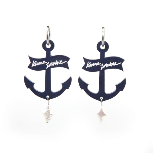 other view of statement navy blue resin anchor with freshwater pearls hoop earrings on a white background