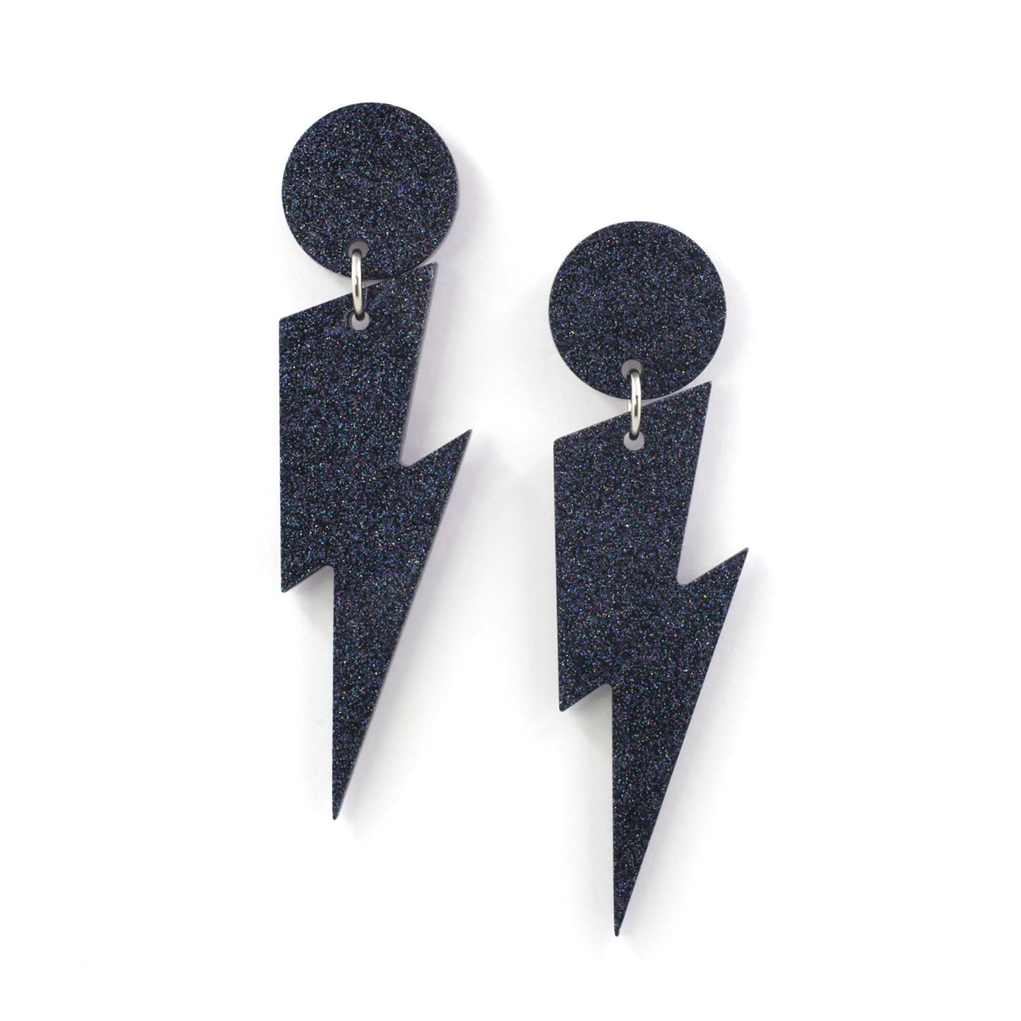 this is a picture of black holographic glitter bolt and dot dangle earrings on a white background.