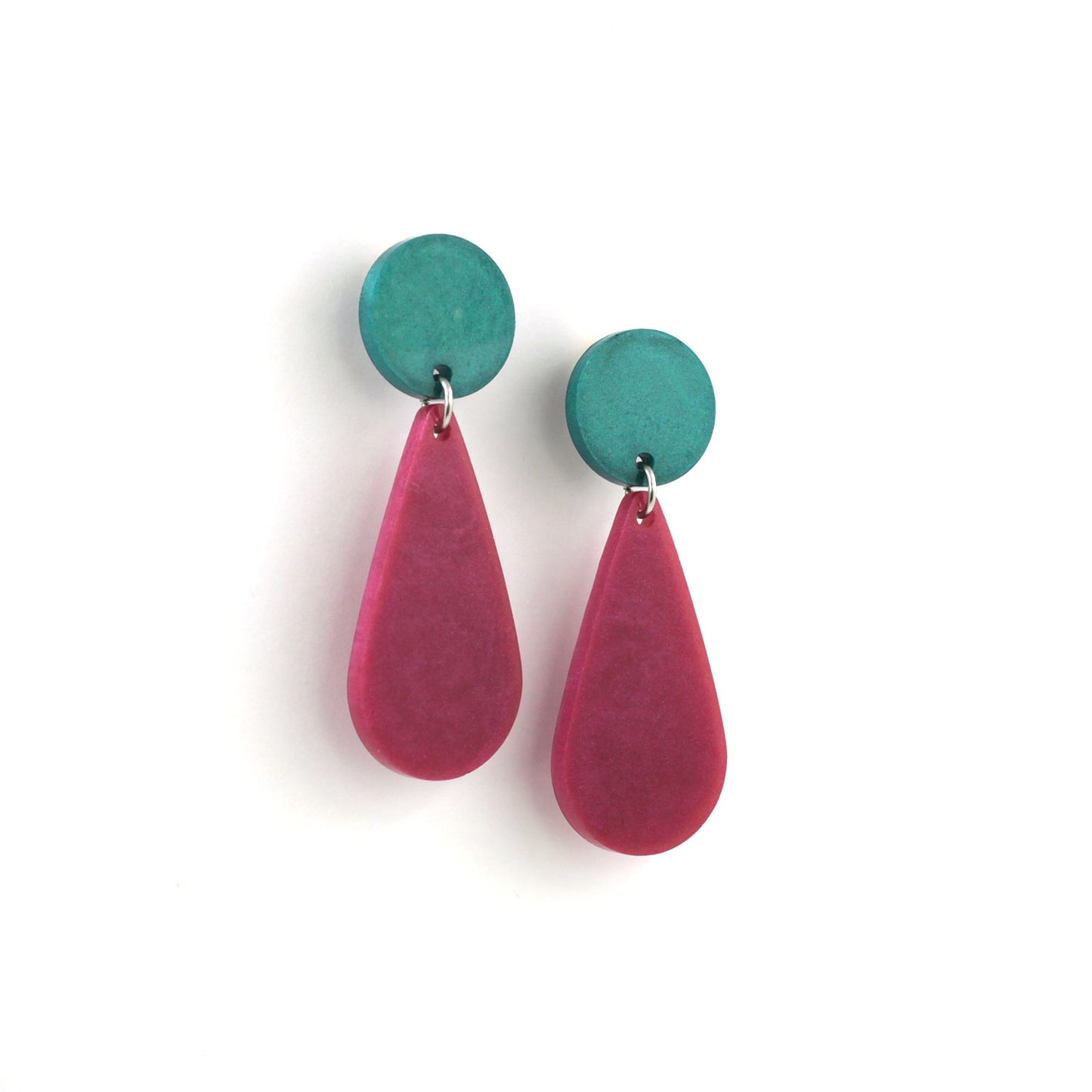 This is a picture of a teardrop dangle earrings on a white background. the top of the earrings is a aqua green dot and the teardrops are dark pink